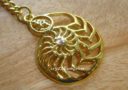 Golden Ammonite Shell with Hum Keychain