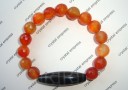 Turtle Back Dzi with Faceted Carnelian