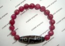 9 Eye Dzi with Faceted Gem Grade Ruby