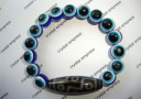 9 Eye Dzi with Blue Evil Eye Bracelet