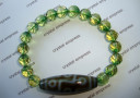 9 Eye Dzi with Faceted Emerald