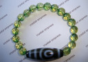 2 Eye Dzi with Faceted Emerald