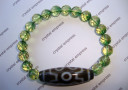 7 Eye Dzi with Faceted Emerald