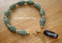 Jade Hotu Charm Bracelet with Hanging Kuan Yin Dzi