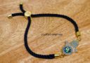 Bejeweled Gold Hamsa Hand Evil Eye Adjustable Rope Bracelet (Black)