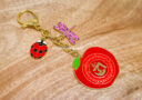 2025 Harmony Apple Amulet Keychain with Ladybug & Dragonfly